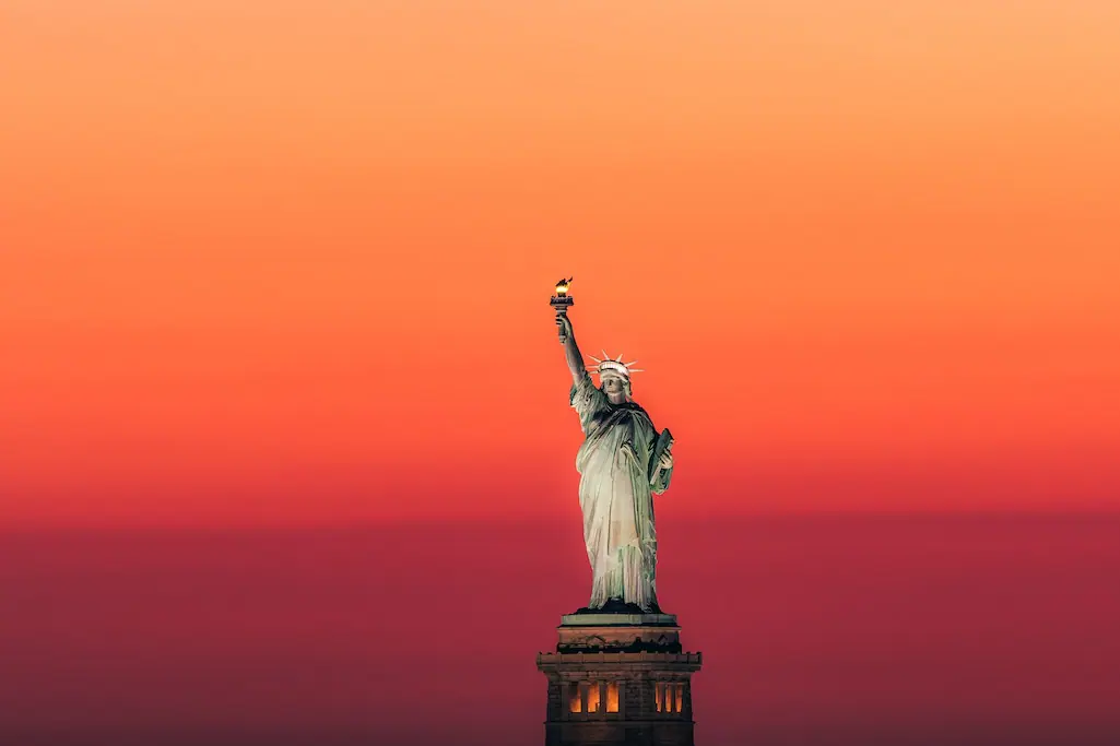 statue of liberty at sunset