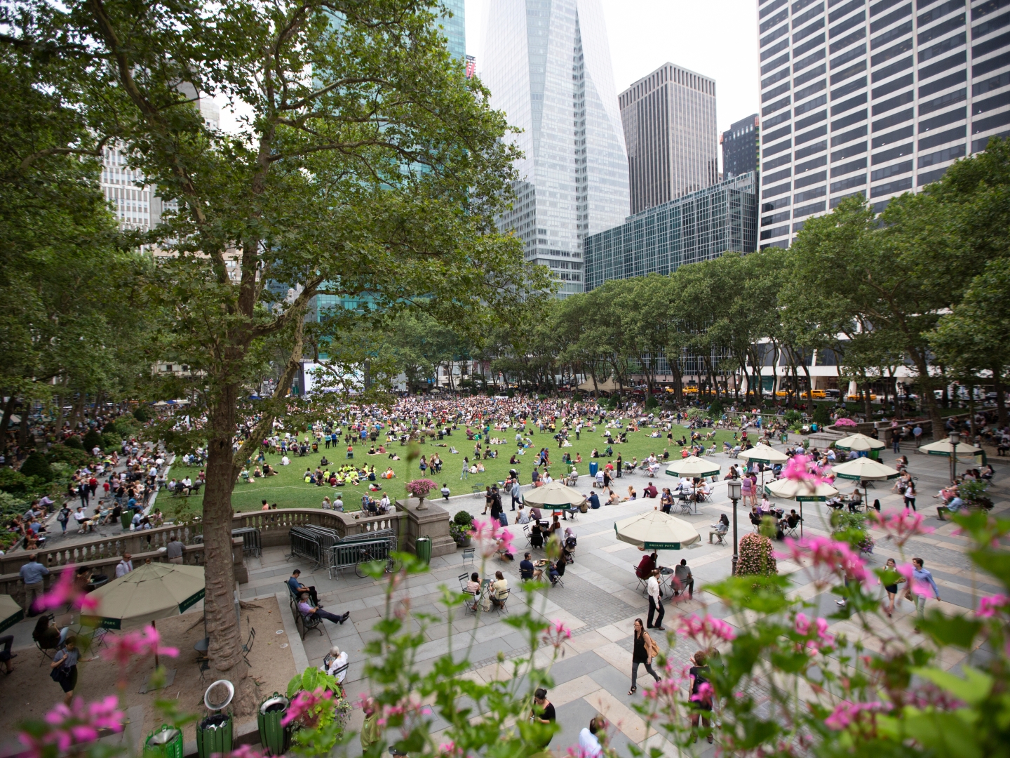 People visiting Bryant Park in the summer